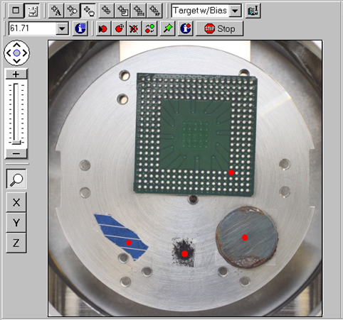 Photograph of a 60 mm diameter sample platen with multiple samples mounted for automated XPS analysis. Photograph of 60 mm diamter sample platen